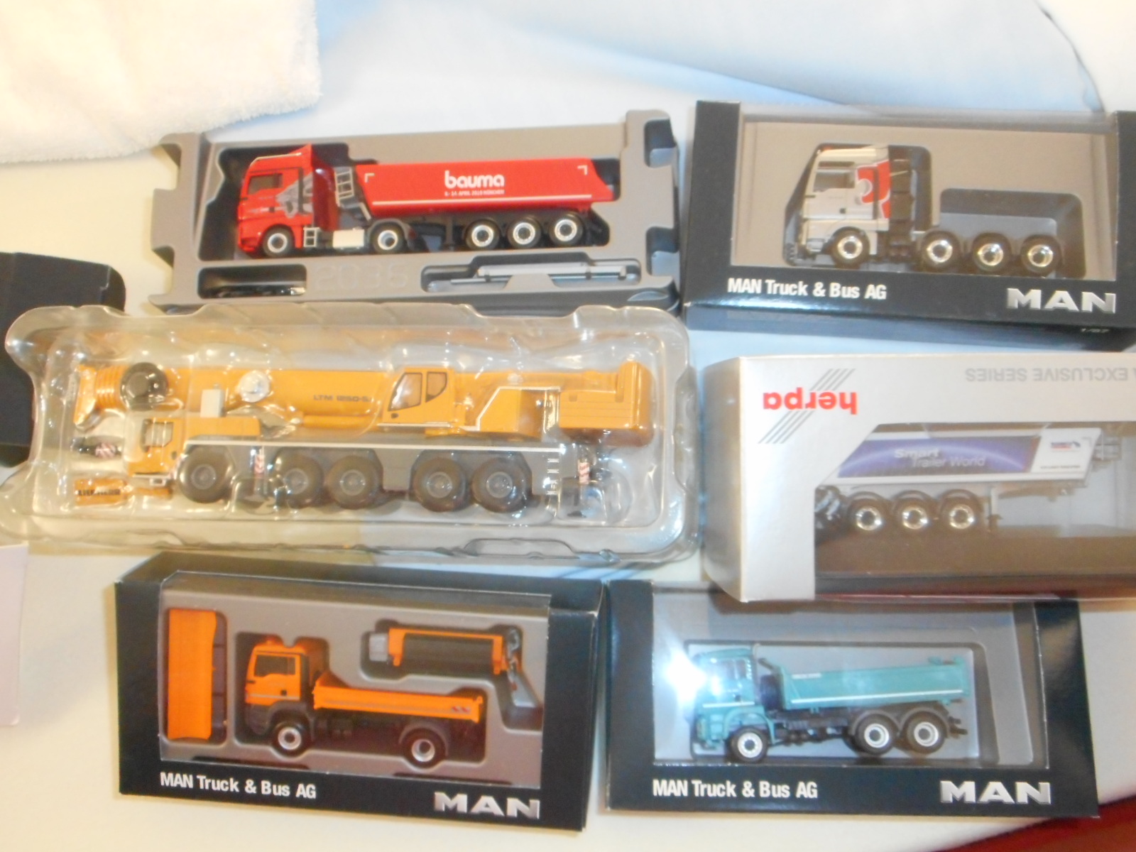 MAN LIEBHERR et SCHMITZ<br />MAN, grue Liebher Ltm 1450 ET benne SCHMITZ